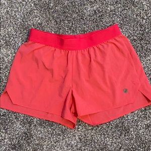 pink asic 3.5 road running shorts